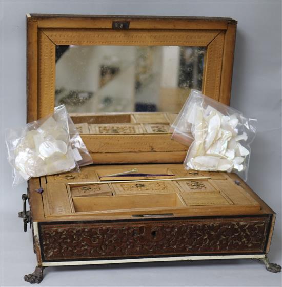 A collection of Chinese mother of pearl counters and an Indian sandalwood sewing box